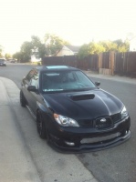 2006 Subaru Impreza WRX with 18x9.75 XXR 527 wheels