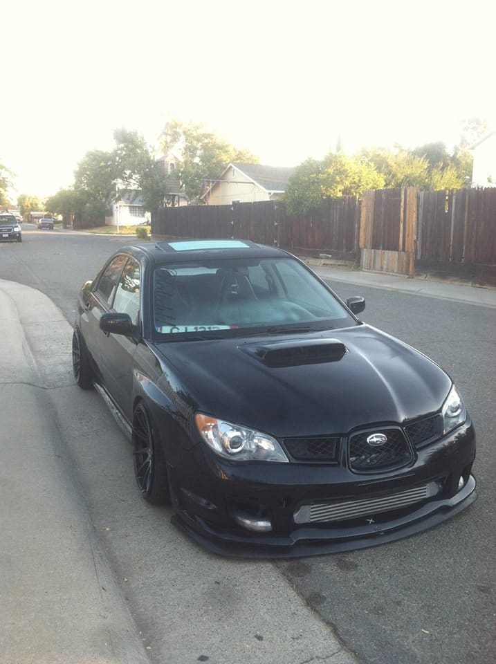 2006 Subaru Impreza WRX with 18x9.75 XXR 527 wheels