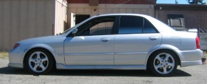 2002 Mazda Protege with 17x8 jnc 001 wheels