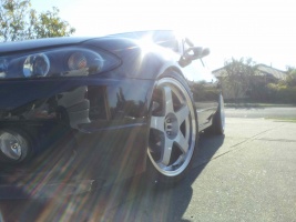 1999 Nissan S15 with 18x8.5 Rota GTR wheels