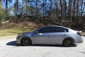 2010 Nissan Altima with 20x10.5 wheels