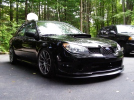 2006 Subaru Impreza WRX with 18x9 Rota G-Force wheels