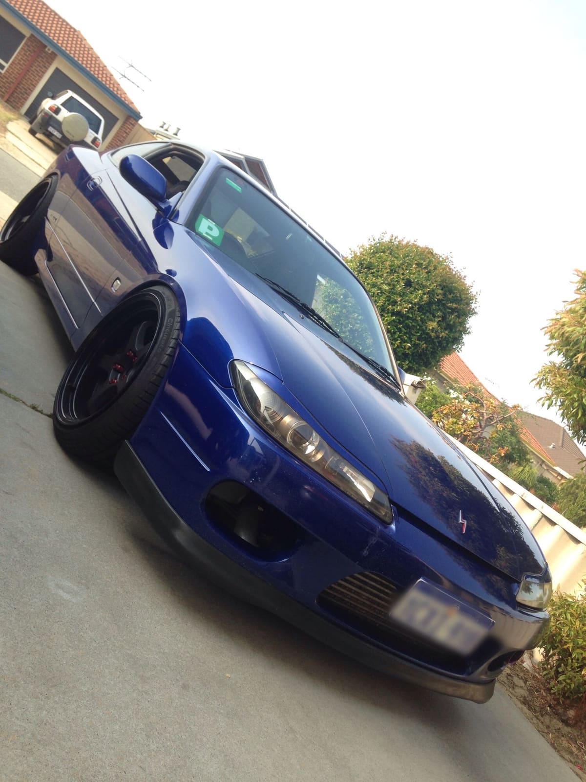 1999 Nissan S15 with 18x9.5 Rota D2 wheels