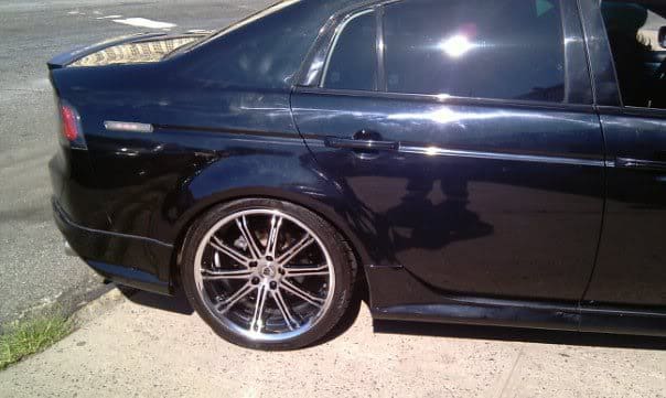 2008 Acura TL with 19x8.5 WORK SC1 wheels