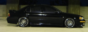 1995 Nissan Maxima with 18x8.5 Tenzo Type M wheels