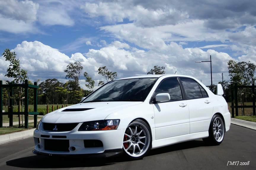2006 Mitsubishi Lancer Evolution with 18x9.5 Titanium Silver CE28 wheels