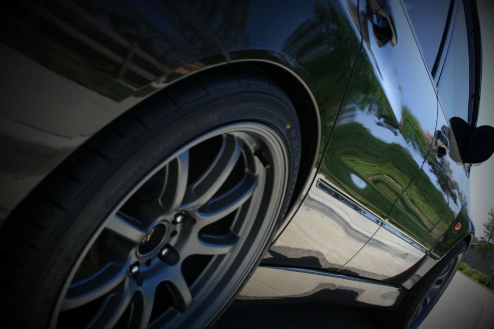 2008 Mitsubishi Lancer Evolution with 18x9.5 Gram Light 57Optimise wheels