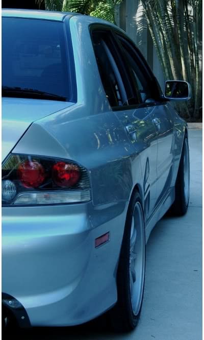 2006 Mitsubishi Lancer Evolution with 18x9.5 Volk CE28 wheels