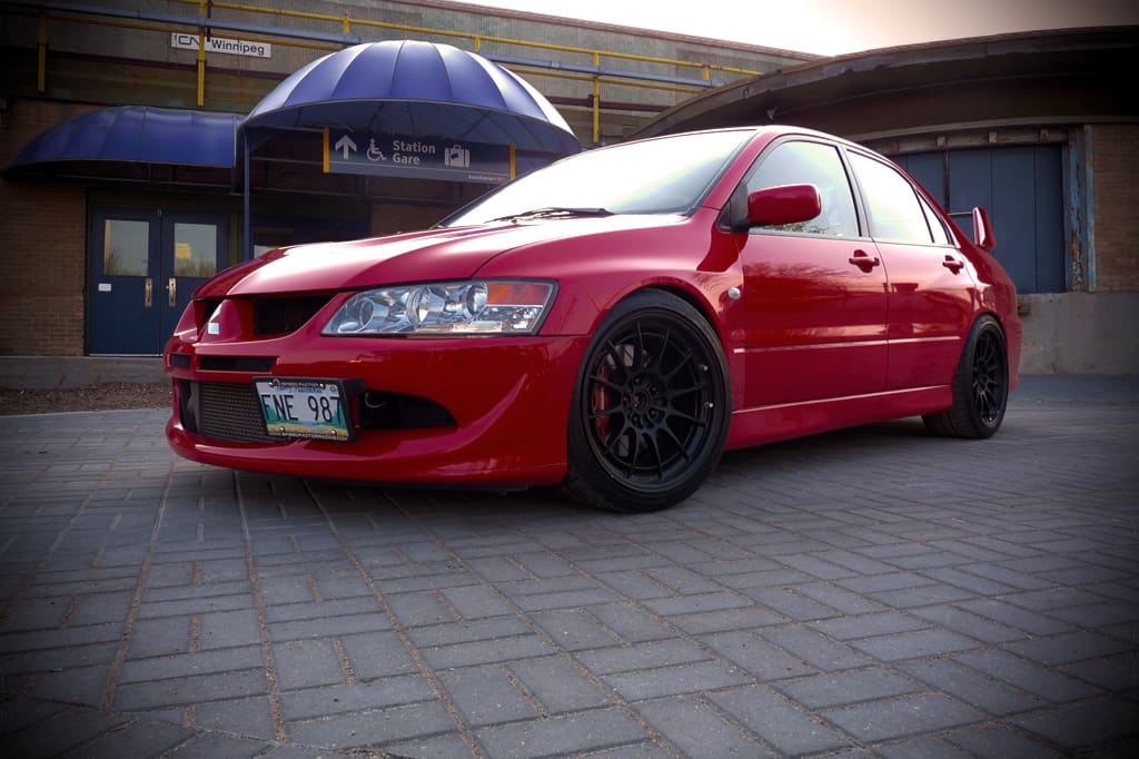 2003 Mitsubishi Lancer Evolution with 18x9.5 Enkei NT03 wheels
