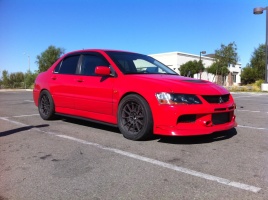 2003 Mitsubishi Lancer Evolution with 18x9.5 Enkei NT03 wheels