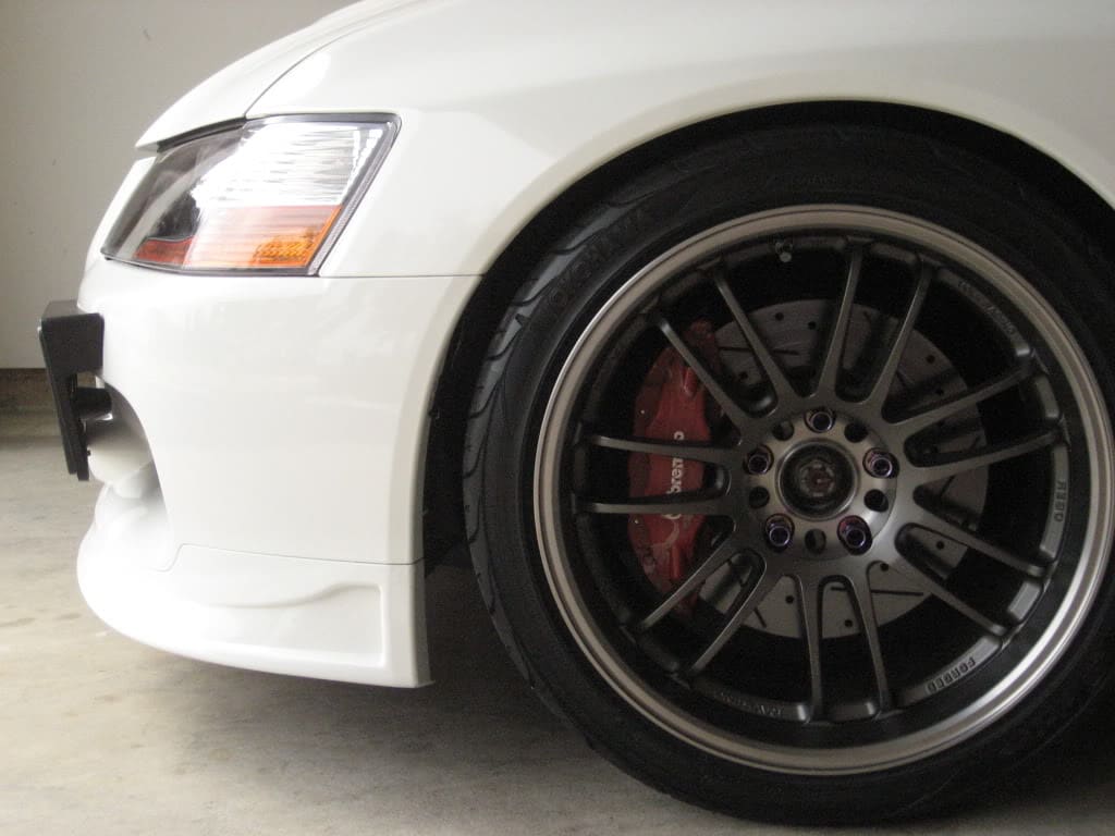 2003 Mitsubishi Lancer Evolution with 18x9.5 Volk RE30 wheels