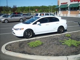 2007 Honda Civic with 17x7 A-tech Final Speed Erasers wheels