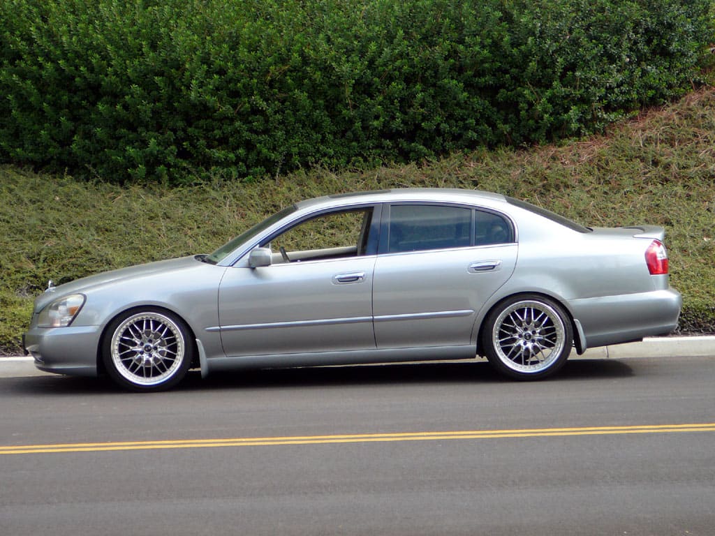 2002 Infiniti Q45 with 20x9.5 Work Wheels Rezax II wheels