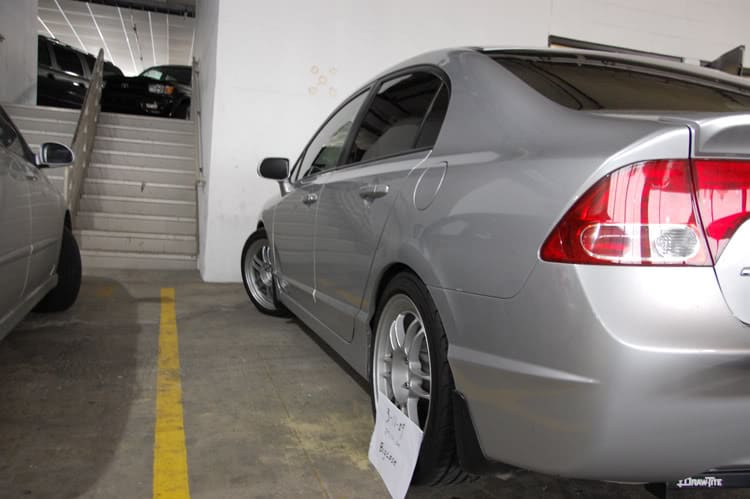 2006 Honda Civic with 17x8 Enkei RPF-1 wheels