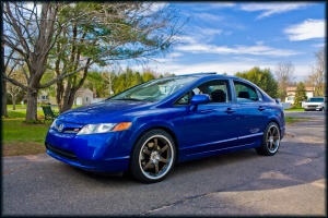 2007 Honda Civic with 18x8.5 Raze R74 bronze wheels