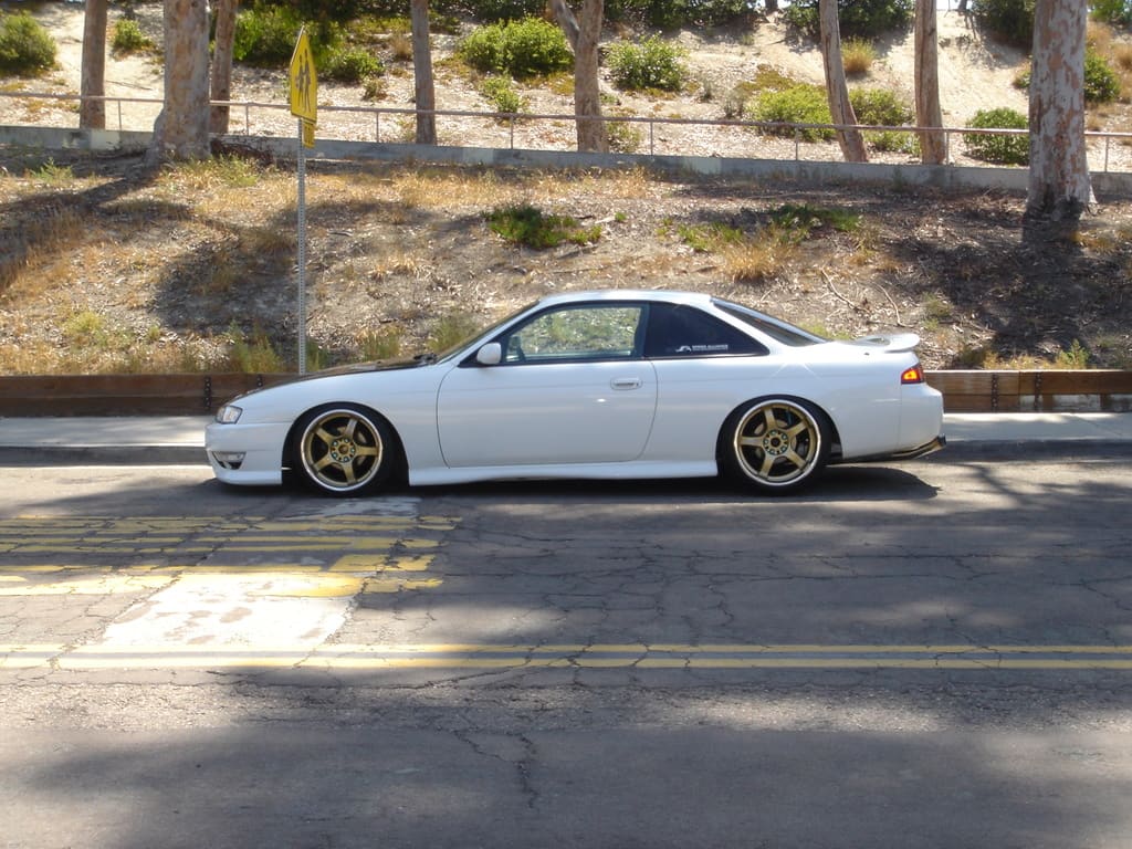 1997 Nissan S14 with 17x10 Rays Engineering Gram Lights 57Pro wheels