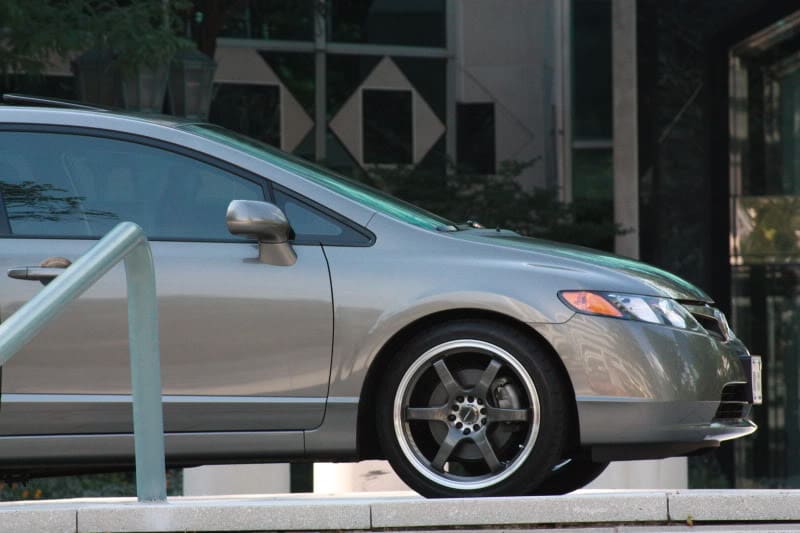 2008 Honda Civic with 18x7.5 Raze R74 wheels