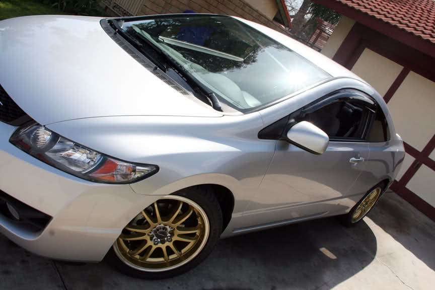 2011 Honda Civic with 17x7 Gold R84 wheels
