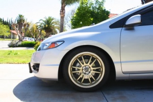 2008 Honda Civic with 17x7 Gold Raze R84 wheels