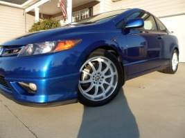 2011 Honda Civic with 17x7 Konig Lightning wheels
