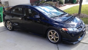 2011 Honda Civic with 17x7 Raze R74 wheels