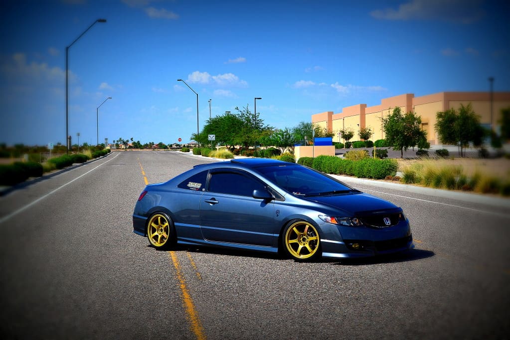 2010 Honda Civic with 17x9 Gramlights 57DR wheels