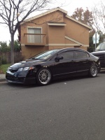 2010 Honda Civic with 17x8 Work Rezax wheels