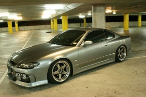 1999 Nissan S15 with 18x9 SSR Professor SP1 wheels
