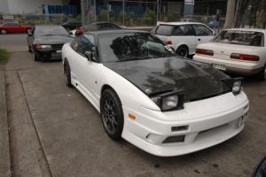 1994 Nissan S13 with 18x8.5 Rays Engineering Volk Racing CE28N wheels