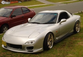 1997 Mazda RX-7 with 18x9 Rays Engineering Volk Racing GT-C wheels