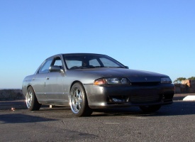 1989 Nissan R31-R34 Skyline 4dr with 17x9 Rays Volk-Racing GT-P wheels