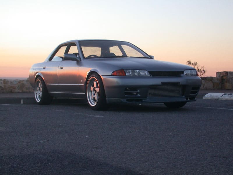 1989 Nissan R31-R34 Skyline 4dr with 17x9 OZ Racing wheels