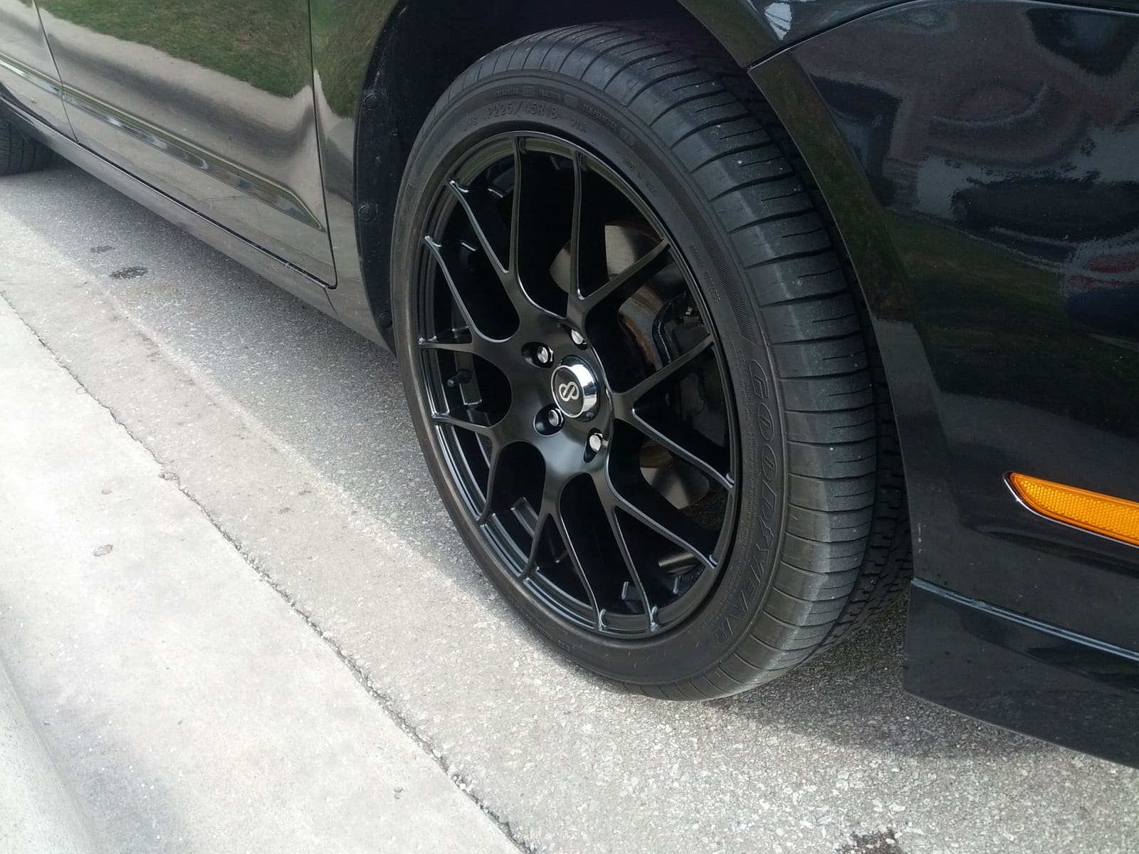 2012 Ford Fusion with 18x8 Enkei Raijin wheels