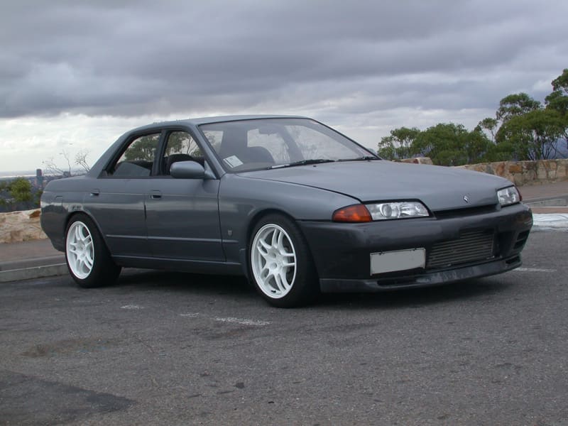 1989 Nissan R31-R34 Skyline 4dr with 17x9 Nissan R33 GTR wheels