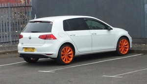 2015 Volkswagen Golf GTI with 18x8 VW INTERLAGOS wheels