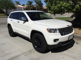 2011 Jeep Grand Cherokee with OEM wheels