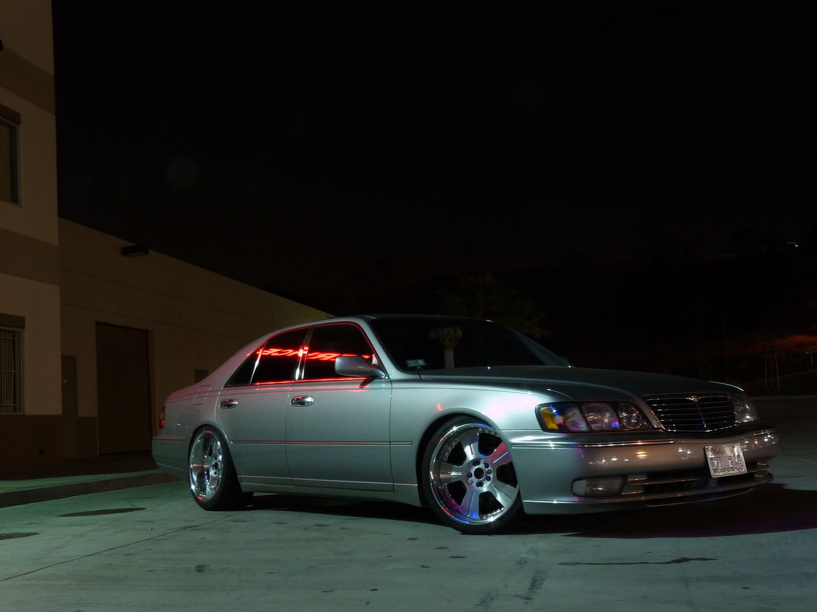1999 Infiniti Q45 with 19x9 Veilside Andrew Golt wheels