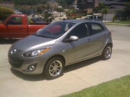 2011 Mazda Mazda2 with 15x6.5 Konig Brite-Lite wheels