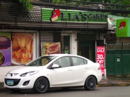 2012 Mazda Mazda2 with 17x7.5 Rota Tuner wheels