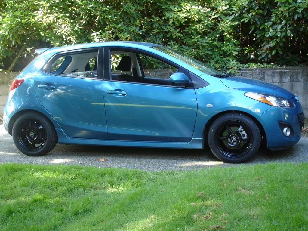 2011 Mazda Mazda2 with 15x7 Motegi Traklite 2.0 wheels