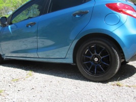 2011 Mazda Mazda2 with 15x6.5 Konig Illusions wheels