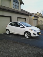 2013 Mazda Mazda2 with 15x8 Rota Slipstream wheels