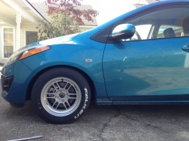2013 Mazda Mazda2 with 14x7 Enkei RPF1 wheels