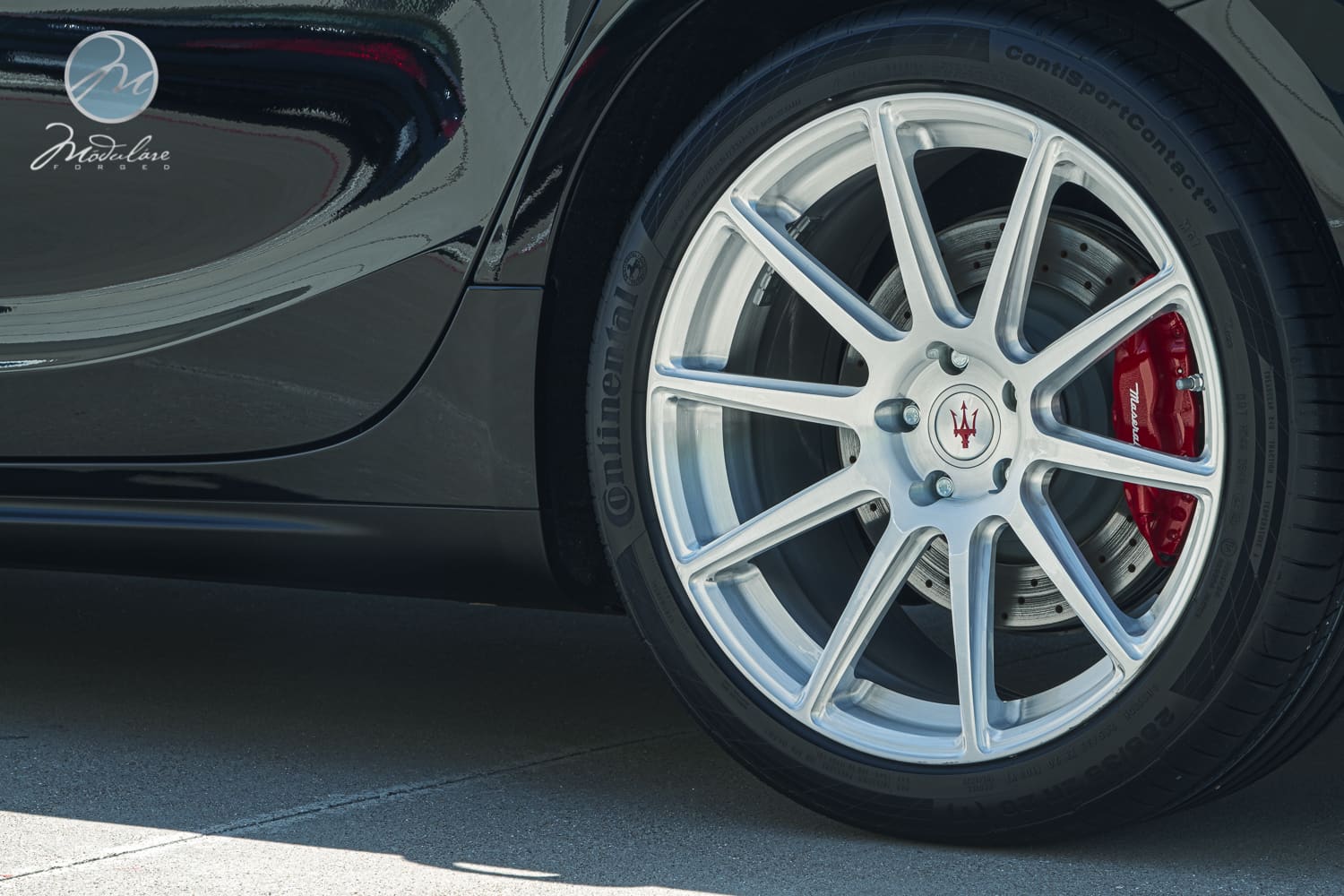 2014 Maserati Ghibli with 20x9 OEM wheels
