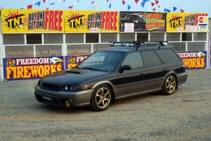 1996 Subaru Legacy with 17x8 Rota Boost wheels