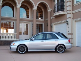 2003 Subaru Impreza WRX with 18x7.5 Rays Engineering Volk Racing GT-N wheels