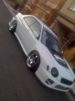 2002 Subaru Impreza WRX with 17x9 Sportmax 050 wheels