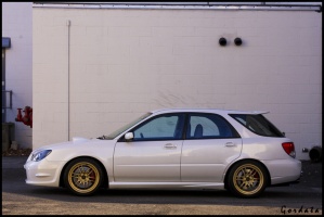 2007 Subaru Impreza WRX with 17x8 Enkei RPF1 wheels