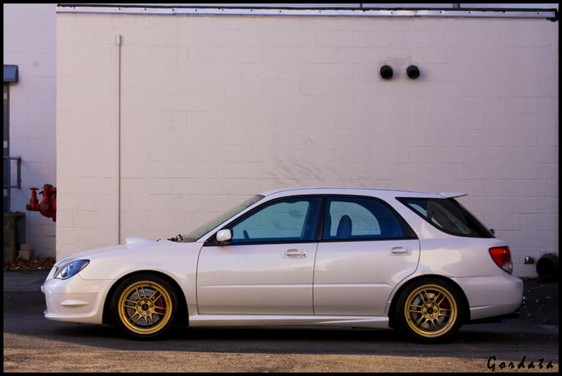 2007 Subaru Impreza WRX with 17x8 Enkei RPF1 wheels