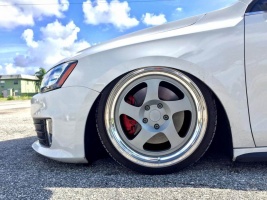 2014 Volkswagen Jetta with 18x9.5 Rotiform TMB wheels